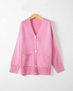 Women's pink knit cardigan sweater featuring a V-neck, front buttons and dual pockets