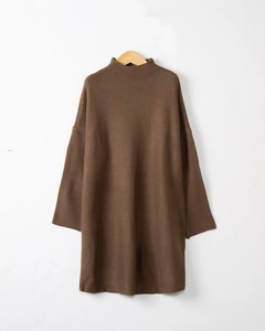 Close-up of the deep brown waffle knit texture and mock neck detail of the sweater dress