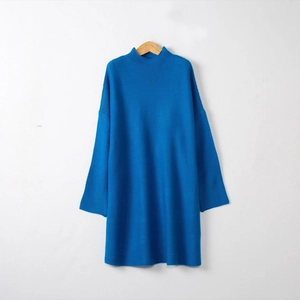 Women's blue turtleneck knit sweater dress with long sleeves and ribbed texture