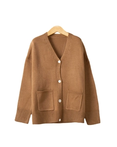 Women's V-neck loose knit cardigan with brown color and white buttons on a wooden hanger