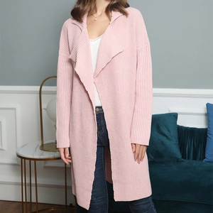 Detail of pink knitted long-sleeve cardigan with ribbed texture and lapel collar design