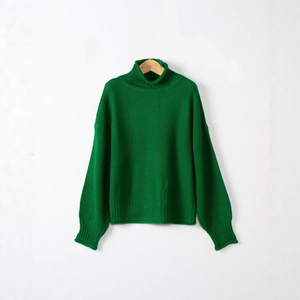 Maglione in maglia a collo alto verde smeraldo da donna con trama a nido d'ape e polsini