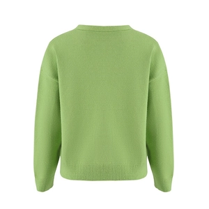 Detail view showing the back side of a light green knit cardigan with ribbed cuffs and hem