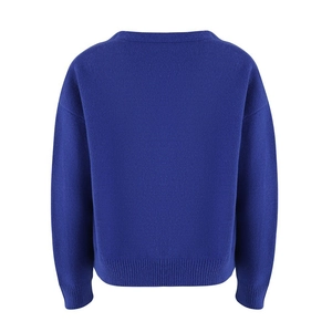 Detail view of royal blue knitted cardigan back featuring ribbed hem and cuffs