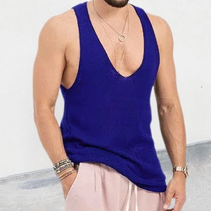 Detailed view of dark blue knitted tank top featuring vertical ribbed texture and V-neckline