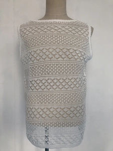 Detailed close-up of white hollow-out knit tank top for men with geometric mesh patterns