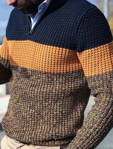 Detail of men's slim fit knit sweater featuring blue, yellow, and grey color-blocking