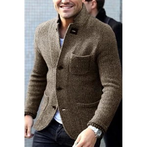 Detail of men's brown tweed knitted blazer showing textured fabric and slim fit design