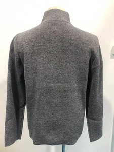 Detailed back view of a grey knitted stand collar cardigan with textured melange fabric