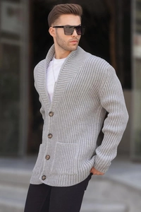 Detail of grey men's shawl collar cardigan with rib-knit texture and large brown buttons