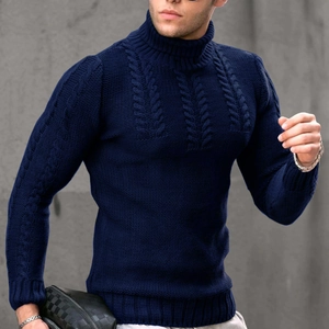 Close-up of navy blue cable knit texture on men's turtleneck sweater for winter