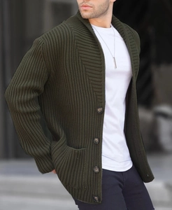 Close-up of deep olive green ribbed knit shawl collar cardigan with dark buttons