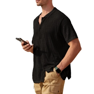 Men's black waffle knit polo shirt with short sleeves and lapel button-down design