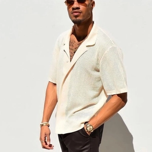 Close-up of off-white knitted short sleeve shirt with breathable mesh hollow texture detail