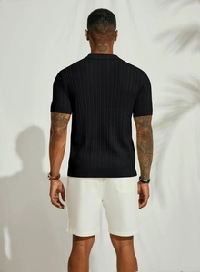 Detailed back view of men's black knit short sleeve polo shirt with ribbed texture