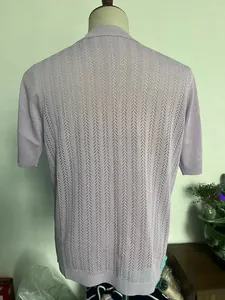 Detail of lavender knit shirt showing the breathable hollow stripe vertical texture