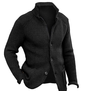 Detail of black waffle knit texture on men's stand collar cardigan with snap buttons