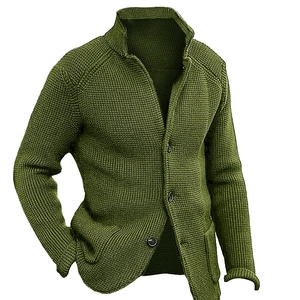 Detail of army green chunky knit cardigan featuring stand collar and buttons