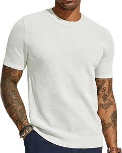 Detailed macro view of white honeycomb mesh knit fabric and ribbed crew neck finish