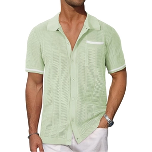 Detail of light green knit short sleeve polo with vertical stripes and pocket texture