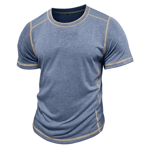 Detail of greyish blue short sleeve Henley shirt with sand colored contrast stitching
