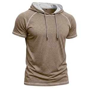 Detail view of khaki heather hooded t-shirt with white contrast stitching and raglan sleeves