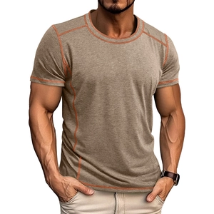 Detail of slim fit brown henley shirt with orange contrast stitching on shoulders and neck