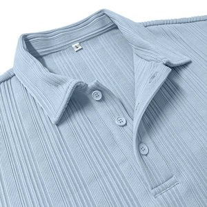 Detail of light blue rib-knit polo shirt collar with three buttons and size L label
