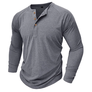 Detailed view of the men's grey Henley shirt neckline with classic wooden buttons