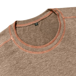 Detail of khakibrown Henley neck with orange contrast stitching and XL size tag