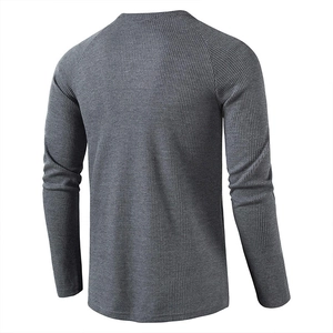 Detail view of charcoal grey waffle knit texture on long sleeve Henley shirt back