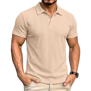 Close-up of beige ribbed polo shirt showing vertical texture and collar detail