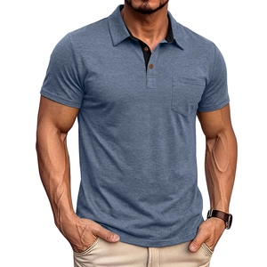 Detail of blue men's polo shirt featuring a chest pocket and contrasting collar trim