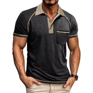 Close-up of contrast collar and buttoned pocket detail on men's short sleeve polo shirt