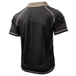 Detail view of men's polo shirt back showing raglan sleeves and curved hem in dark grey
