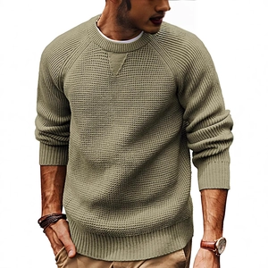 Men's olive green waffle knit thick sweater with crew neck and ribbed cuffs in casual style