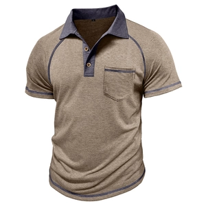 Detail of khaki waffle knit polo shirt showing raglan sleeves and contrast navy blue collar