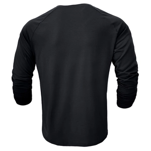 Rear view of black long sleeve Henley shirt featuring raglan sleeves and soft fabric texture