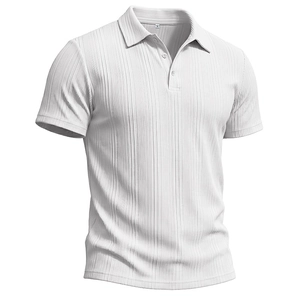 Detailed view of white men's polo shirt with vertical stripe knit texture and ribbed collar