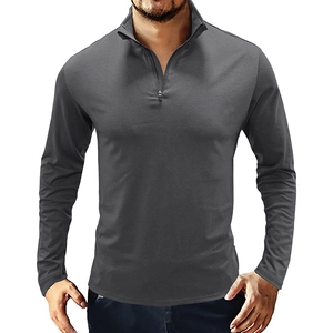 Detailed close-up of the quarter-zip stand collar and stitching on the men's long sleeve top