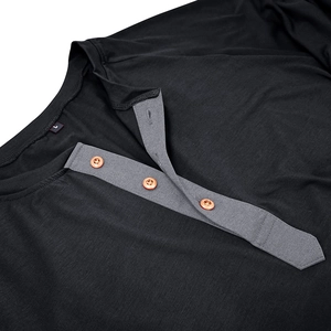 Detail of men's Henley shirt collar with grey contrast placket and bronze buttons