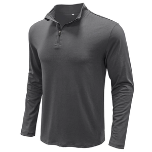 Close-up of men's quarter-zip polo shirt collar with metal zipper and soft fabric texture