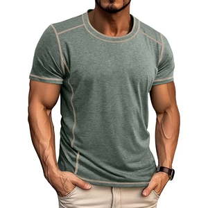 Detail of slim fit olive green t-shirt with contrast stitching and soft ribbed fabric