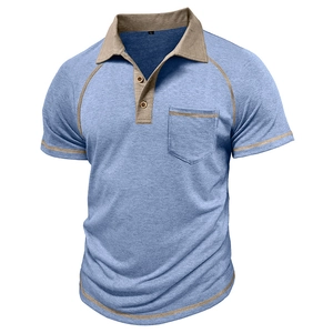 Detail of light blue waffle knit polo shirt with khaki contrast collar and chest pocket