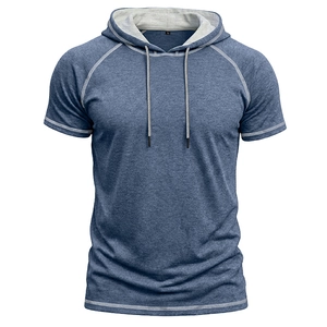 Detail view of denim blue hooded t-shirt with grey lining hood and raglan sleeve design