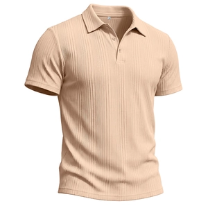 Close-up of apricot polo shirt with vertical ribbed texture and classic 3-button collar