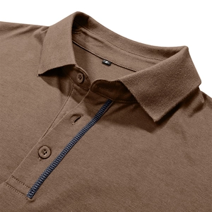 Close-up of brown polo shirt collar with blue trim detail and size S tag on white background