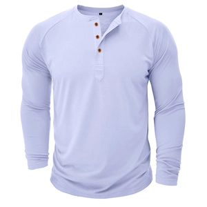 Close-up of the lavender Henley shirt collar with three brown wooden buttons and knit texture