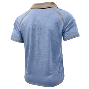 Rear view of light blue heather polo shirt with raglan sleeves and contrast stitching