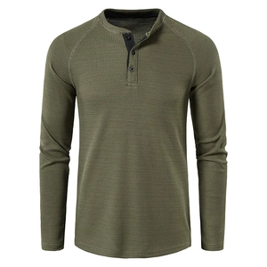 Close-up of military green waffle knit Henley shirt showing texture and three-button collar